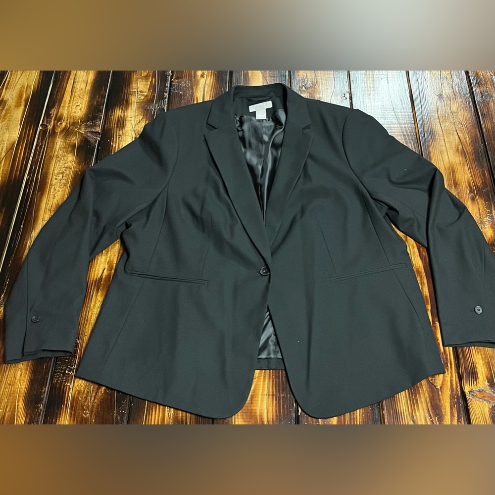 Woman’s black blazer.